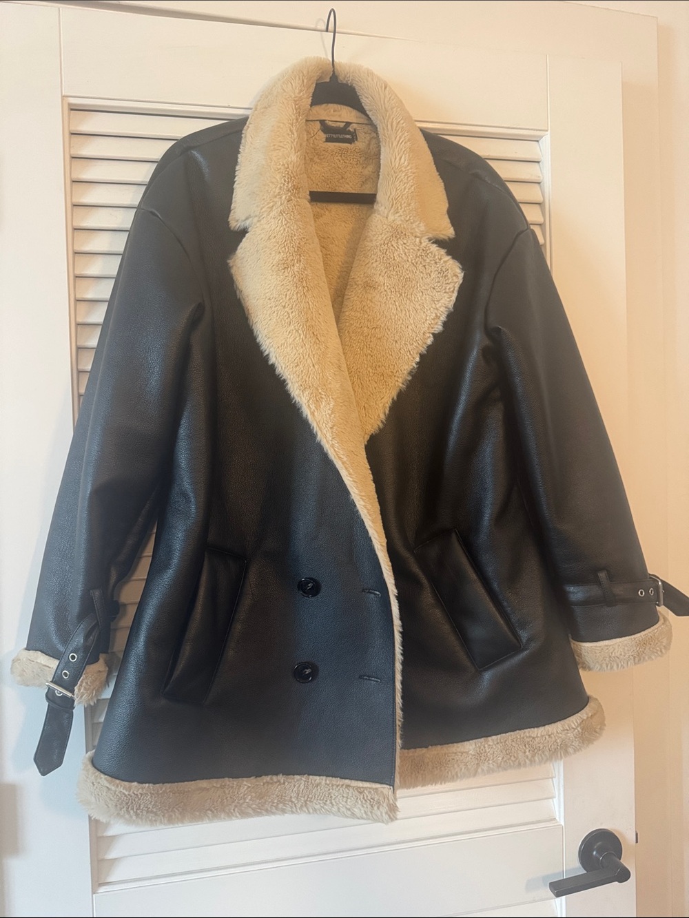 PrettyLittleThing Black Faux Leather Shearling Coat with Cream Lining